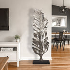 Grande sculpture en métal en forme de feuille