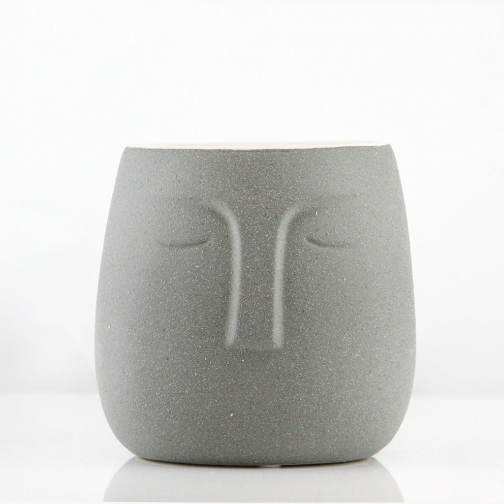 Pot et jardinière en céramique endormi