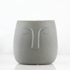 Pot et jardinière en céramique endormi