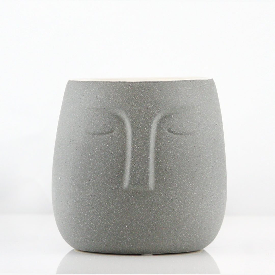 Pot et jardinière en céramique endormi