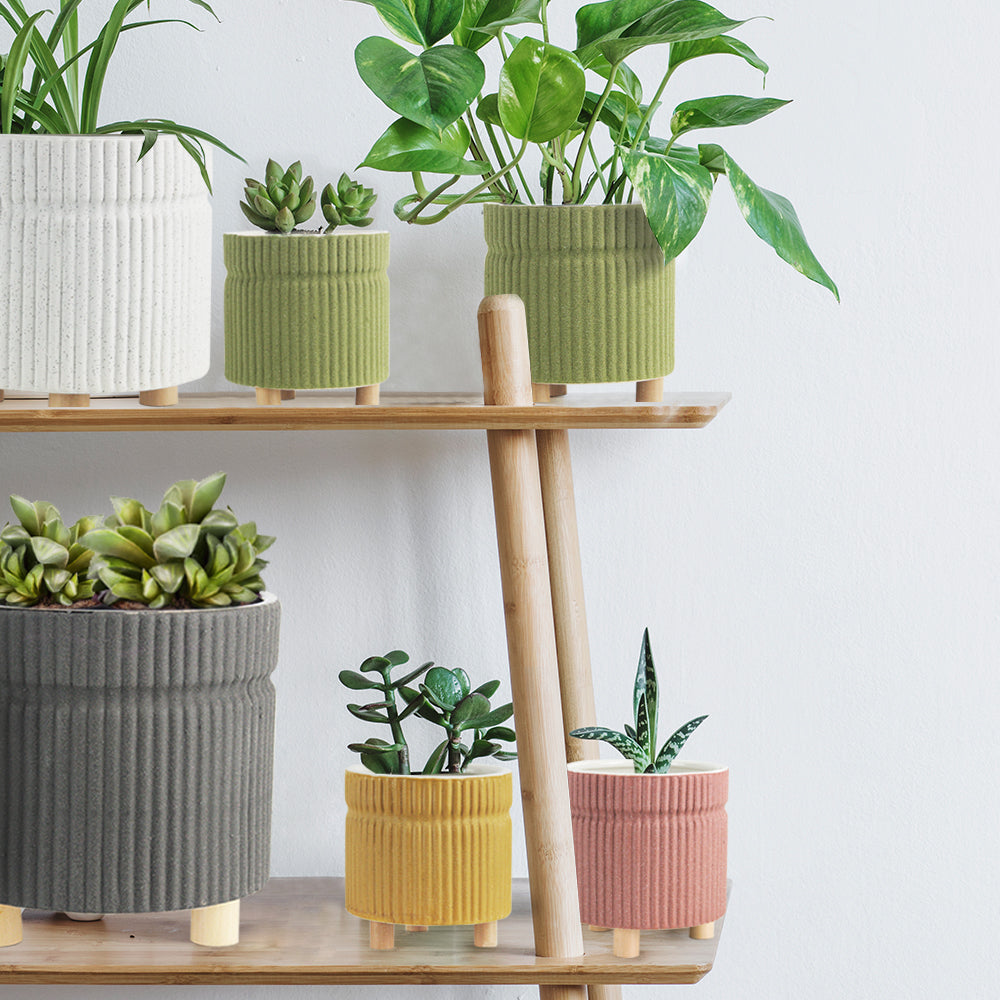 Pot trépied rainuré