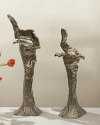 Bougeoir sculptural en métal fondu