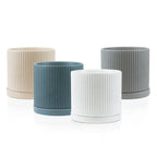 Pot en céramique cannelée avec soucoupe