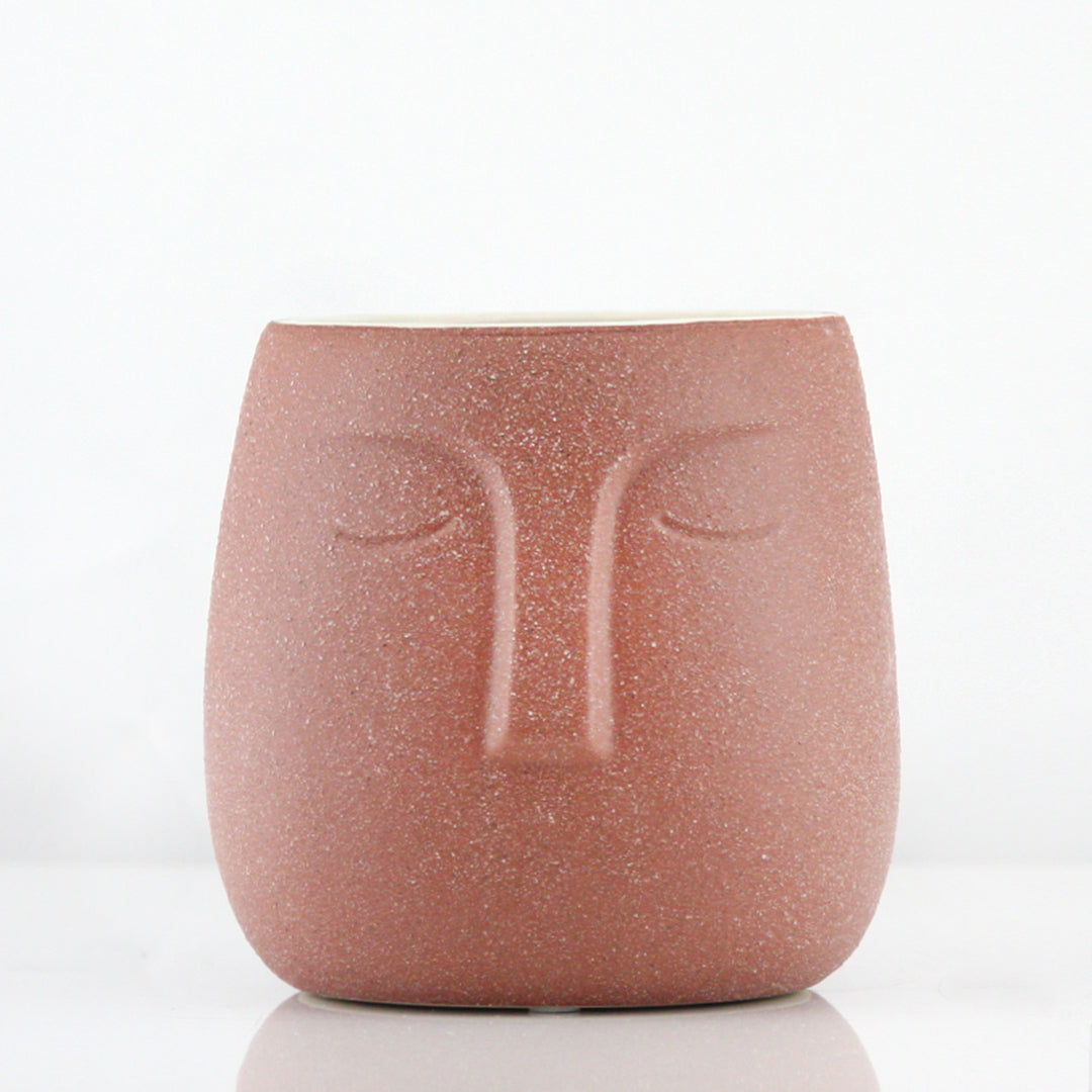 Pot et jardinière en céramique endormi